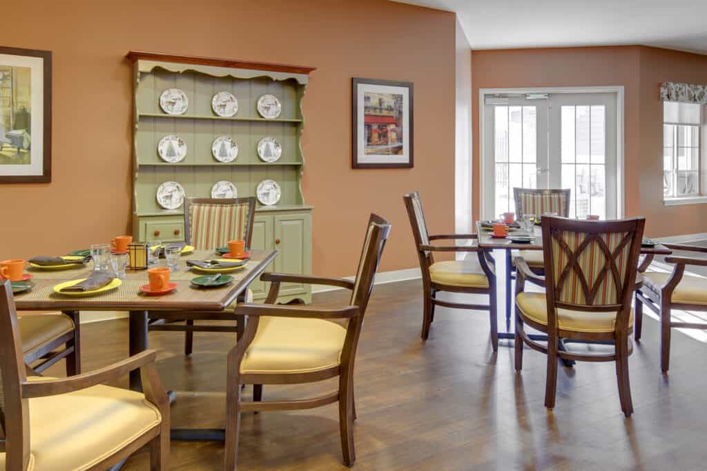 A photo of the Compass Memory Support Neighborhood dining room at Farmington Station