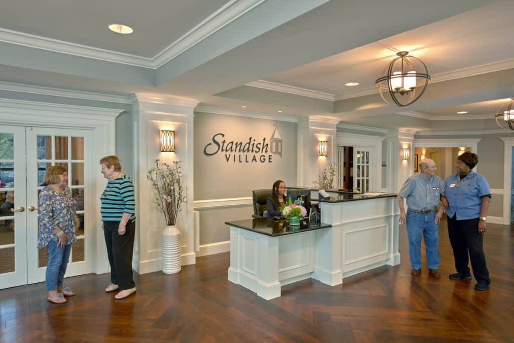 The spacious, bustling lobby where friendly staff welcome all residents and guests near Milton.