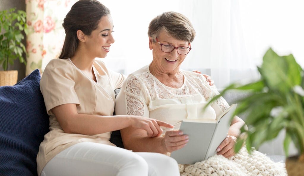 older and younger woman reading in marlboro nj