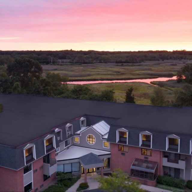 The exterior of Anchor Bay East Providence at sunset.