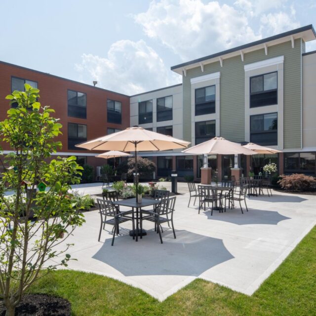 The sunny, outdoor courtyard at Anchor Bay Greenwich.
