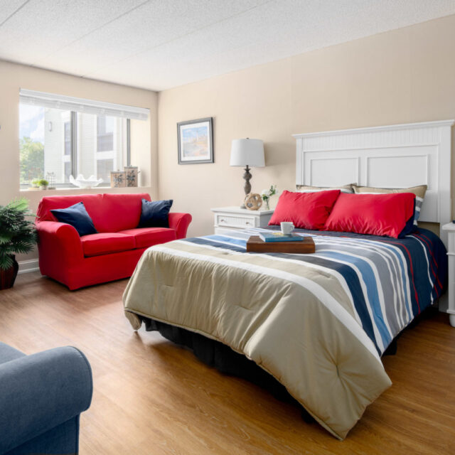 A studio bedroom at Anchor Bay Greenwich assisted living.