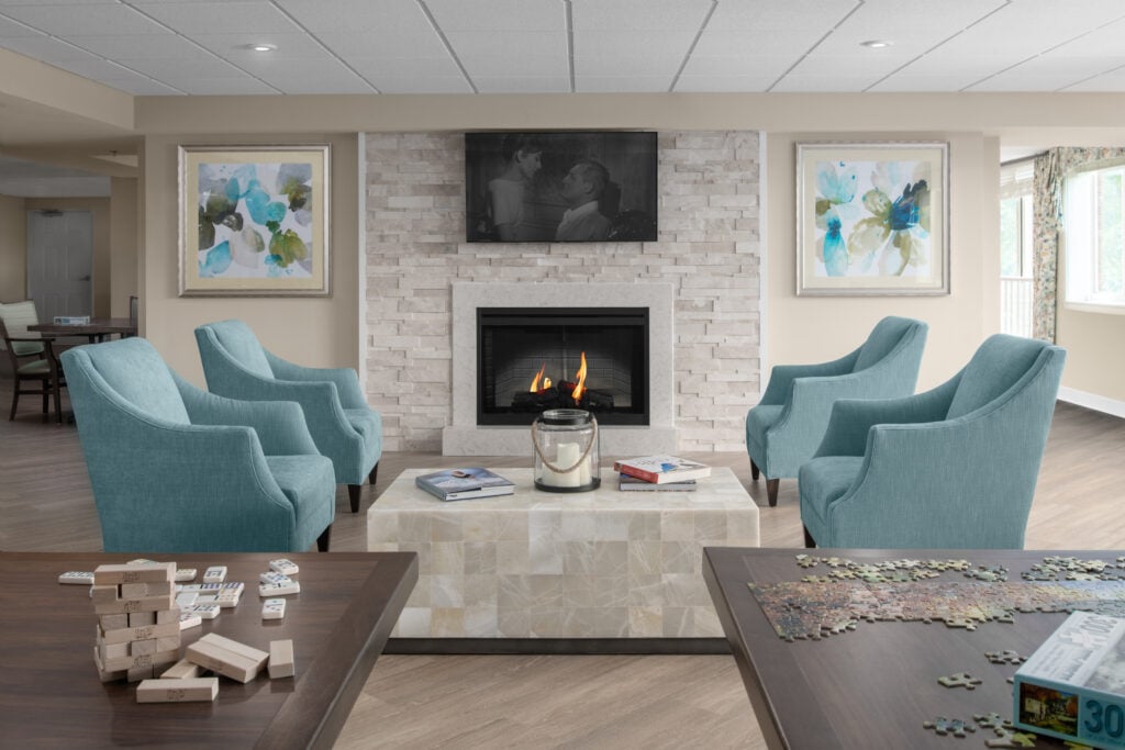 An head on shot of the living room inside the Compass Memory Support Neighborhood at Anchor Bay East Providence.