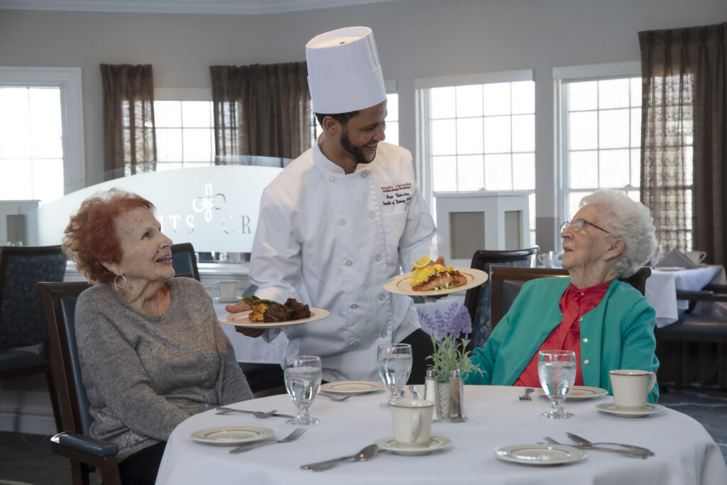 Dining Director serving Residents at Heights Crossing